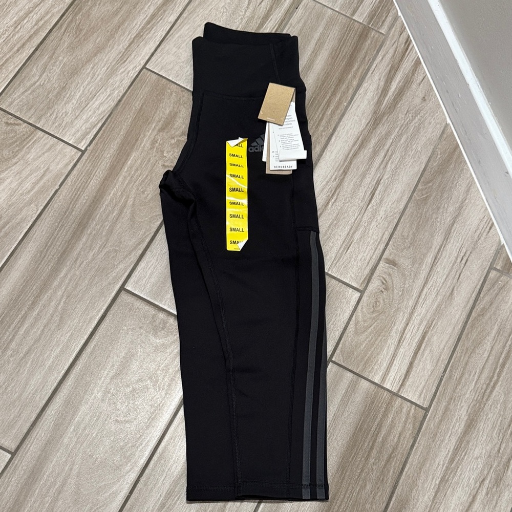 Adidas Woman’s Black and Gray Crop Leggings